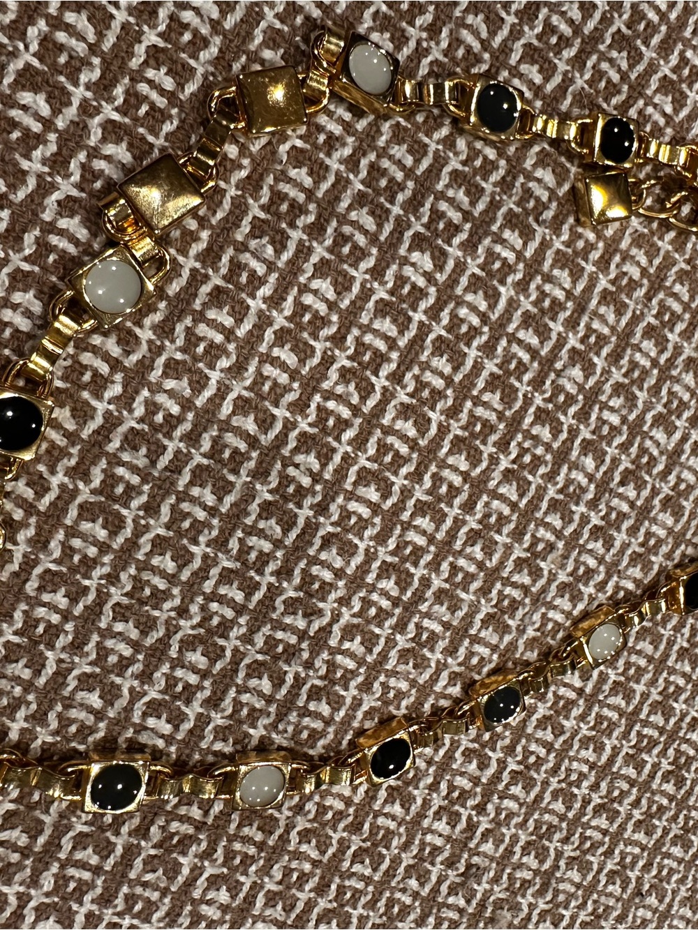 Gold-Tone Chain Belt Accent with Black Enamel Detail